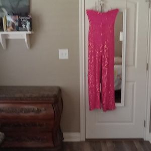 Strapless hot pink sequined pant suit. New with tags. Size small brand nova